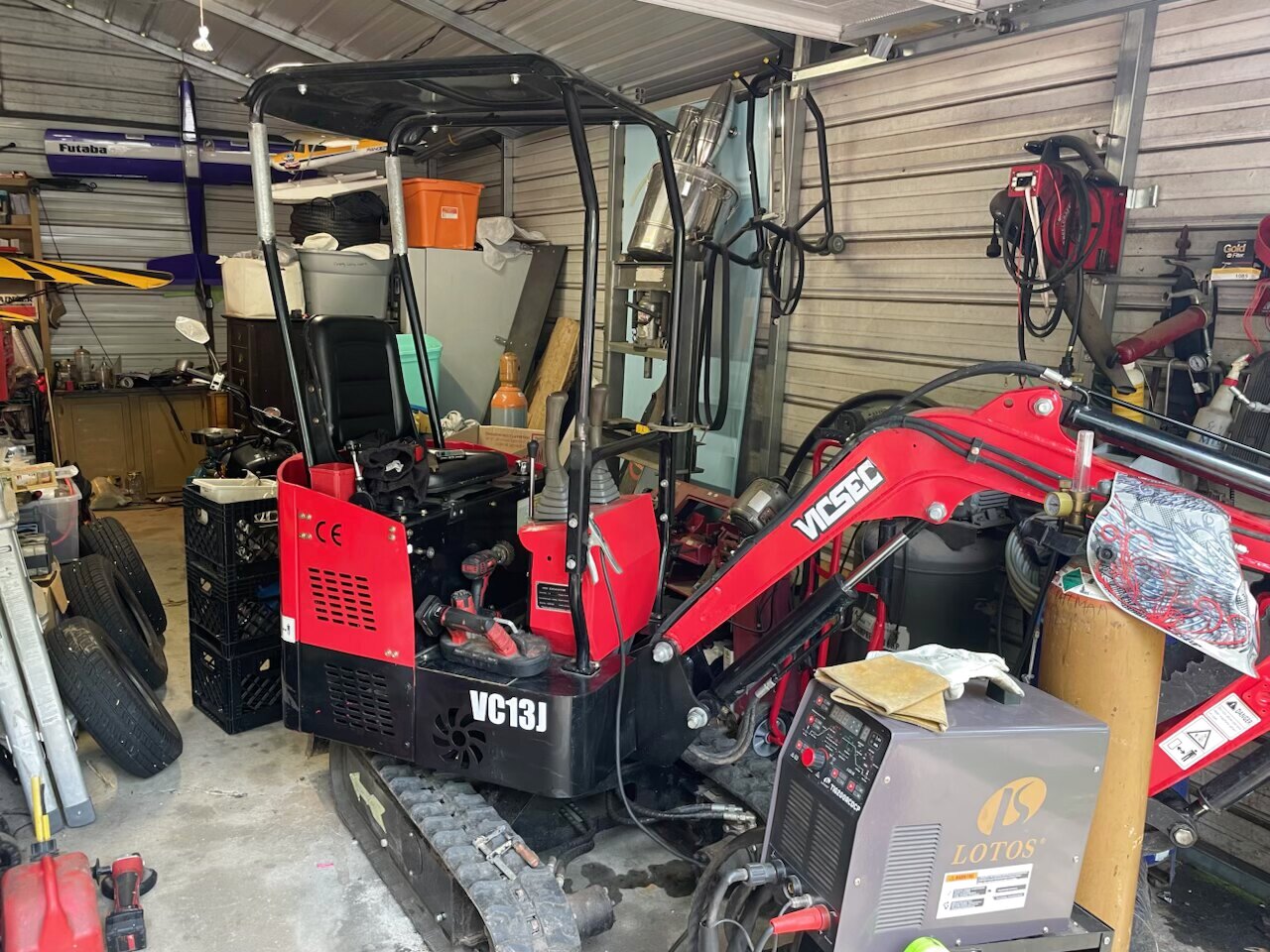 Little Diggers VC13J mini excavator staged in the shop